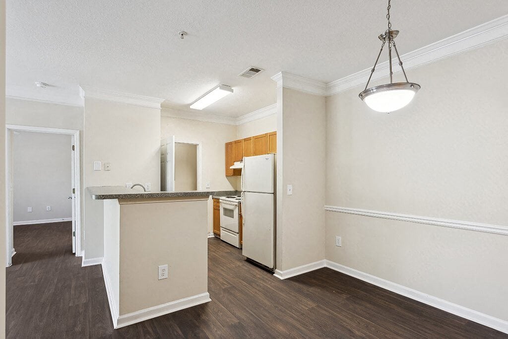Dining room and kitchen at Lakeside Vista Apartments in Kennesaw GA